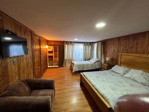 Postelja oz. postelje v sobi nastanitve Hostal Chumay