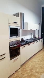 Kuchyňa alebo kuchynka v ubytovaní Apartment Rome 18