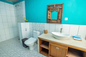 Koupelna v ubytování The Tanis Beach Resort Nusa Lembongan