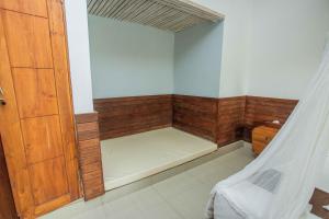 Postel nebo postele na pokoji v ubytování The Tanis Beach Resort Nusa Lembongan