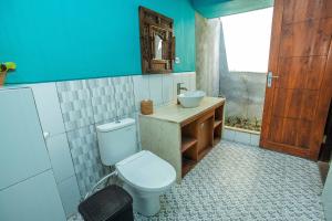 Koupelna v ubytování The Tanis Beach Resort Nusa Lembongan