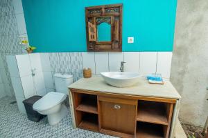 Koupelna v ubytování The Tanis Beach Resort Nusa Lembongan