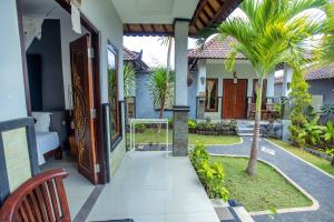 Zahrada ubytování The Tanis Beach Resort Nusa Lembongan
