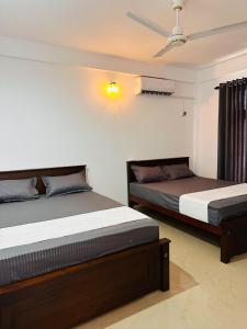 Ένα ή περισσότερα κρεβάτια σε δωμάτιο στο Ocean Villa