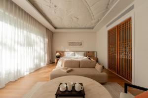 Letto o letti in una camera di Dali Taoxi Secret Manor