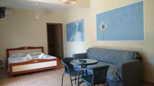 Ένα ή περισσότερα κρεβάτια σε δωμάτιο στο Stelios House +62 φωτογραφίες