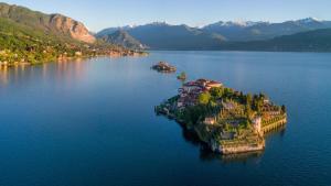 an island in the middle of a large body of water at Dimore della Cisterna in Stresa