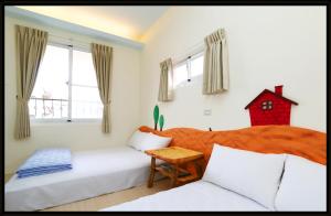 Un pat sau paturi într-o cameră la Bella Casa B&B