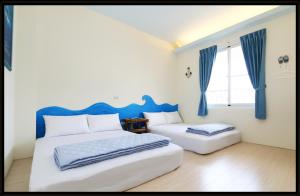Un pat sau paturi într-o cameră la Bella Casa B&B