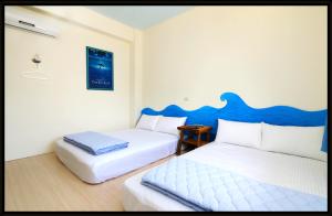 Un pat sau paturi într-o cameră la Bella Casa B&B