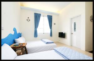 Un pat sau paturi într-o cameră la Bella Casa B&B