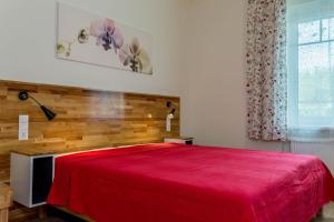 Łóżko lub łóżka w pokoju w obiekcie Ferienhaus Burgenland 2