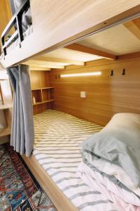 Good Morning International Chain Hostel Of Yining City客房内的一张或多张床位