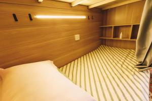 Good Morning International Chain Hostel Of Yining City客房内的一张或多张床位