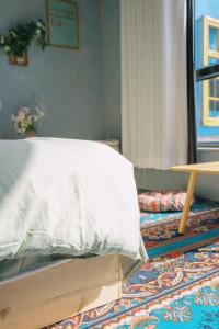 Good Morning International Chain Hostel Of Yining City客房内的一张或多张床位
