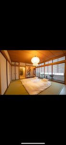 Un pat sau paturi într-o cameră la onfleek西九条3F