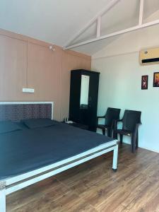 Voodi või voodid majutusasutuse Hotel Skylark toas