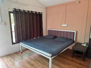 Voodi või voodid majutusasutuse Hotel Skylark toas