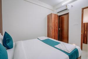 D Nest Inn客房内的一张或多张床位