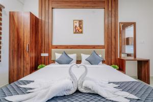 D Nest Inn客房内的一张或多张床位