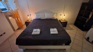 En eller flere senge i et værelse på Grazioso Appartamento a 500m da Piazza del Campo - ZTL Free