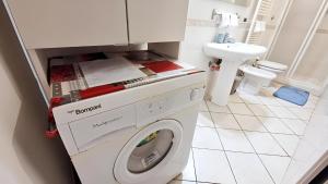 Et badeværelse på Grazioso Appartamento a 500m da Piazza del Campo - ZTL Free