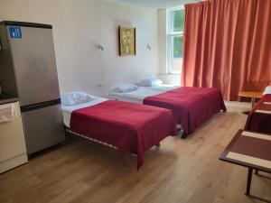 Katil atau katil-katil dalam bilik di Viva Nord Hotel