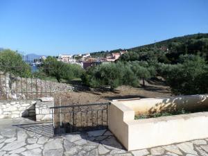 a view from the top of a hill with trees at Rosa's Studios in Fiskardo