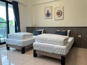 Letto o letti in una camera di Yang