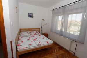 Posteľ alebo postele v izbe v ubytovaní Total Relax Apartmanház