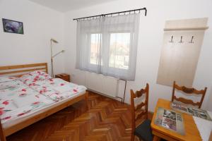 Posteľ alebo postele v izbe v ubytovaní Total Relax Apartmanház