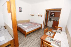 Posteľ alebo postele v izbe v ubytovaní Total Relax Apartmanház