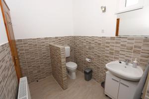 Kúpeľňa v ubytovaní Total Relax Apartmanház