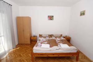 Posteľ alebo postele v izbe v ubytovaní Total Relax Apartmanház