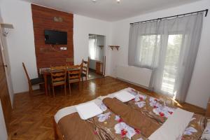 Posteľ alebo postele v izbe v ubytovaní Total Relax Apartmanház
