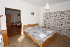Posteľ alebo postele v izbe v ubytovaní Total Relax Apartmanház