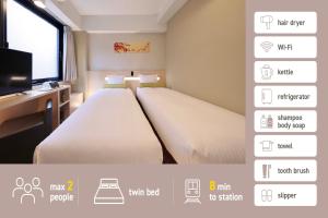 Postel nebo postele na pokoji v ubytování Shinsaibashi-Higashi Crystal Hotel