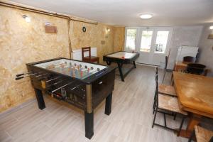 Herňa v ubytovaní Total Relax Apartmanház