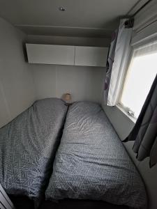 Postel nebo postele na pokoji v ubytování Mobilhome 6 personnes