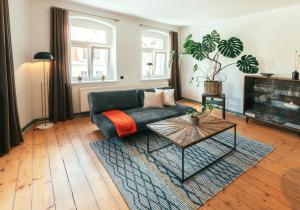 Posezení v ubytování Ferienwohnung Gustav Kaiser Apartment - 60qm Design Fewo Zittauer Gebirge - Unterkunft in historischer Altstadt im Dreiländereck