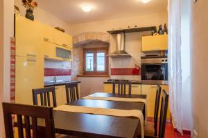 Kuchyň nebo kuchyňský kout v ubytování Casa Menta