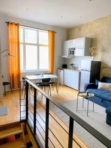 Kuchyň nebo kuchyňský kout v ubytování Charming apartment Bordeaux TRAM D Croix Seguey