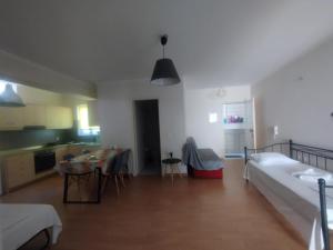 A bed or beds in a room at Lalezas Studios
