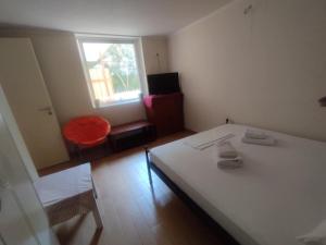A bed or beds in a room at Lalezas Studios