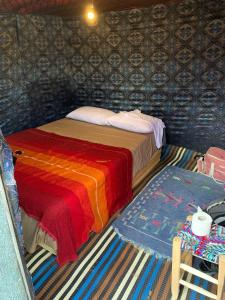 Postel nebo postele na pokoji v ubytování Merzouga Camping Trek