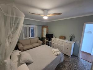 Katil atau katil-katil dalam bilik di Apartamento Brisa de Cullera