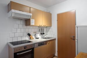 Kuchyň nebo kuchyňský kout v ubytování Haus Gletscherblick