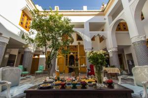 En balkong eller terrasse på Riad Amor - Suite & Spa