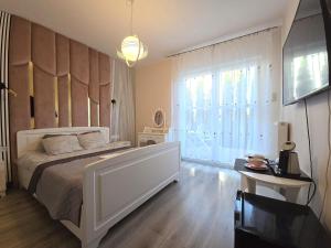 Postel nebo postele na pokoji v ubytování Villa Lima