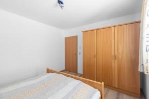 Postel nebo postele na pokoji v ubytování Haus Gletscherblick